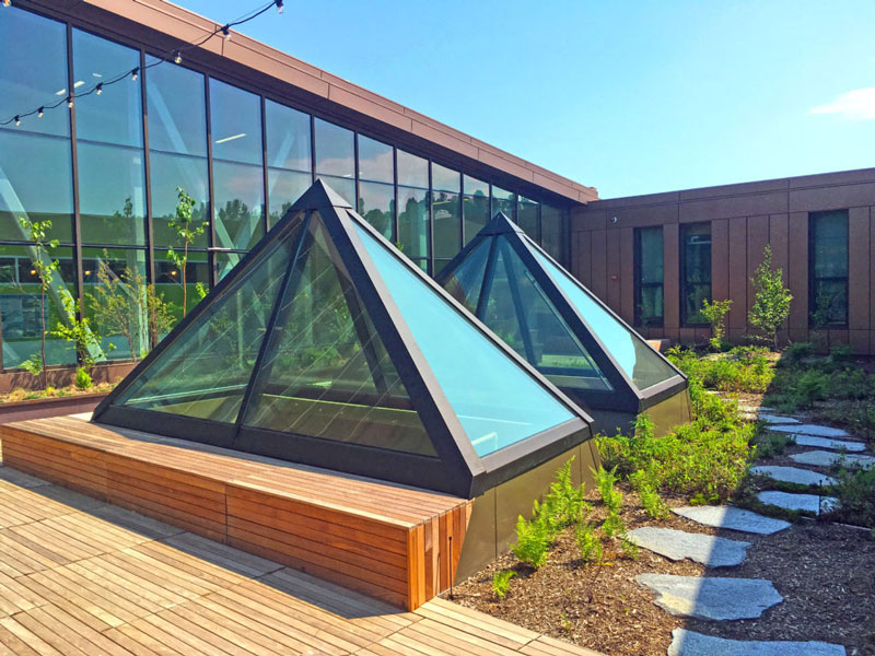 large triangular skylights over basement room